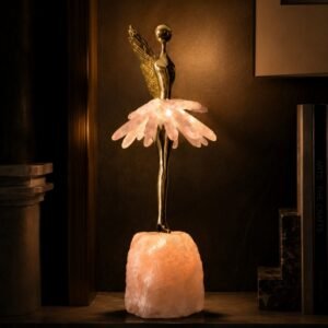 Luxury fairy sculpture lamp featuring rose quartz crystal petals and illuminated crystal base.