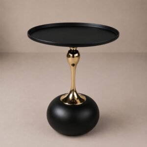 Luxury black side table with round tabletop, polished gold pedestal stem, and sculptural spherical base.
