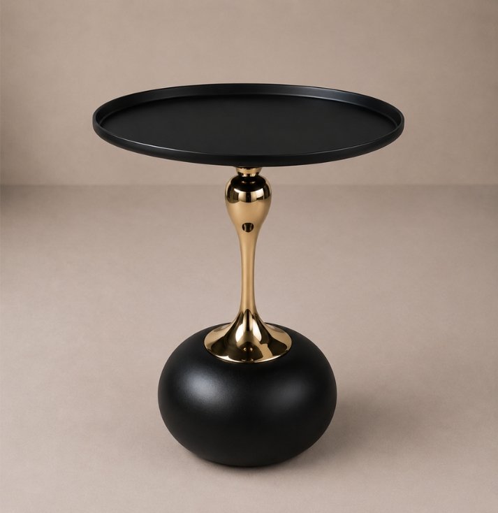 Midnight Noir Pedestal Side Table Luxury black side table with round tabletop, polished gold pedestal stem, and sculptural spherical base.