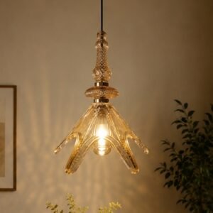 Luxury crystal glass pendant light featuring flower-inspired sculptural arms, decorative crystal detailing, and warm ambient illumination in a sophisticated contemporary interior.