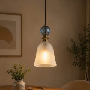 Luxury frosted glass pendant light with brass accents and decorative blue glass detail.