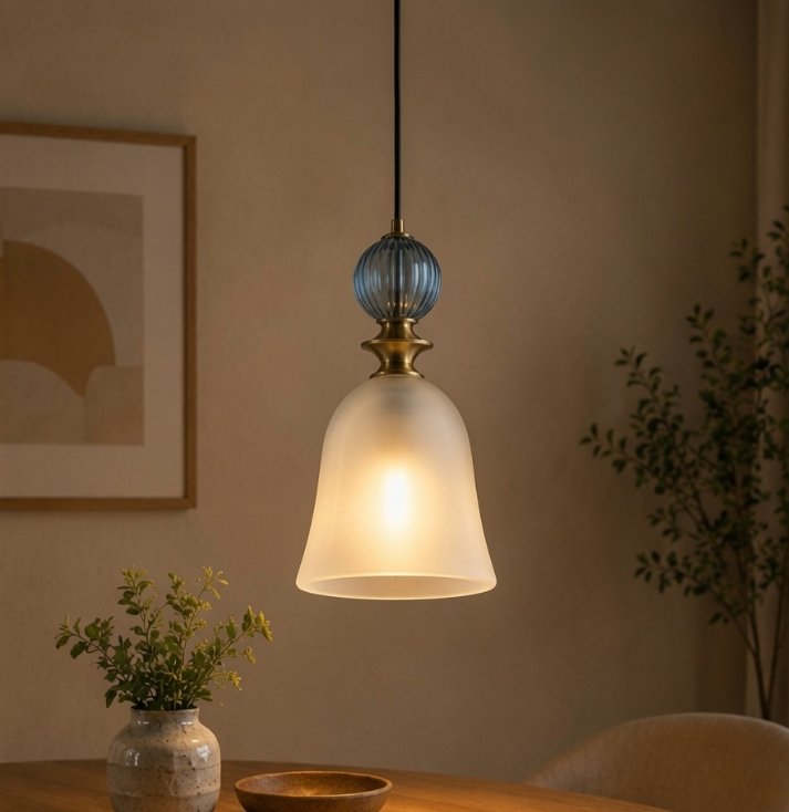 Luna Frost Glass Pendant Light – Elegant Luxury Pendant Lamp Luxury frosted glass pendant light with brass accents and decorative blue glass detail.