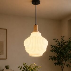 Luxury ribbed pendant light with a sculptural white shade, natural wood accents, and warm ambient illumination, suspended in a modern Scandinavian-inspired interior.