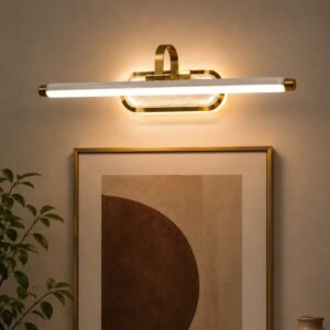 Luxury brushed gold LED picture light with a sleek linear design mounted above framed wall artwork, providing elegant illumination and ambient halo lighting in a sophisticated interior.
